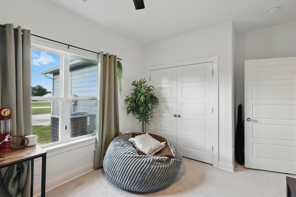 121 Bluegrass Trail Springtown, TX 76082 - Photo 28 of 39 a living room with furniture and a window