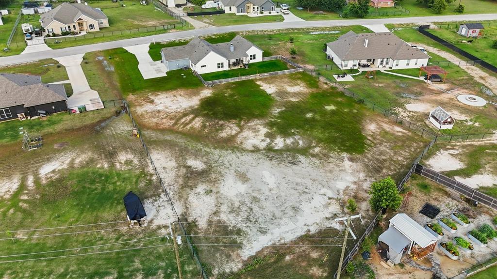 121 Bluegrass Trail Springtown, TX 76082 - Photo 39 of 39 an aerial view of a house with yard swimming pool and outdoor seating