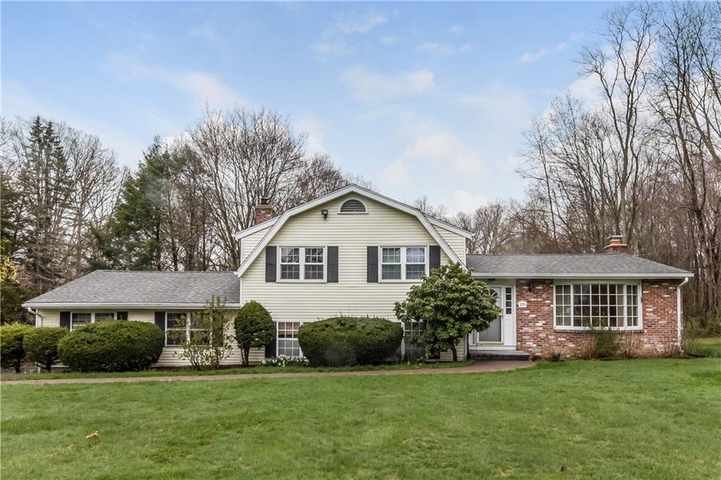 WELCOME HOME... sited back from the road on almost 1 1/2 acres, this 4-level split offers 3 bedrooms and 2 1/2 baths.