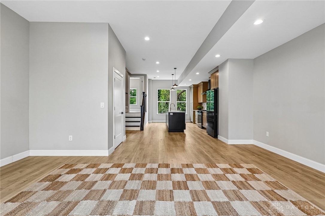 3906 Edwards Road, Unit C Cincinnati, OH 45209 - Photo 20 of 46 This inviting space offers a seamless flow from the living area to the kitchen, perfect for everyday living.