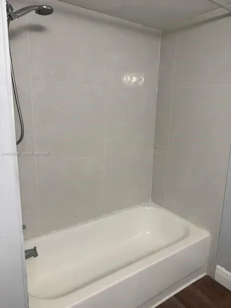 a bathroom with a bathtub