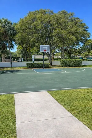 a view of a golf course with a lake view