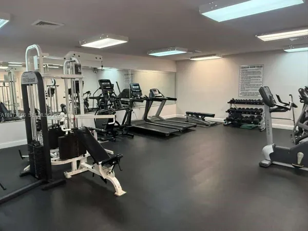 a view of a room with gym equipment