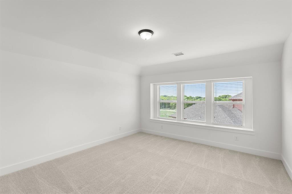 413 Tower Street DeSoto, TX 75115 - Photo 24 of 30 an empty room with a window