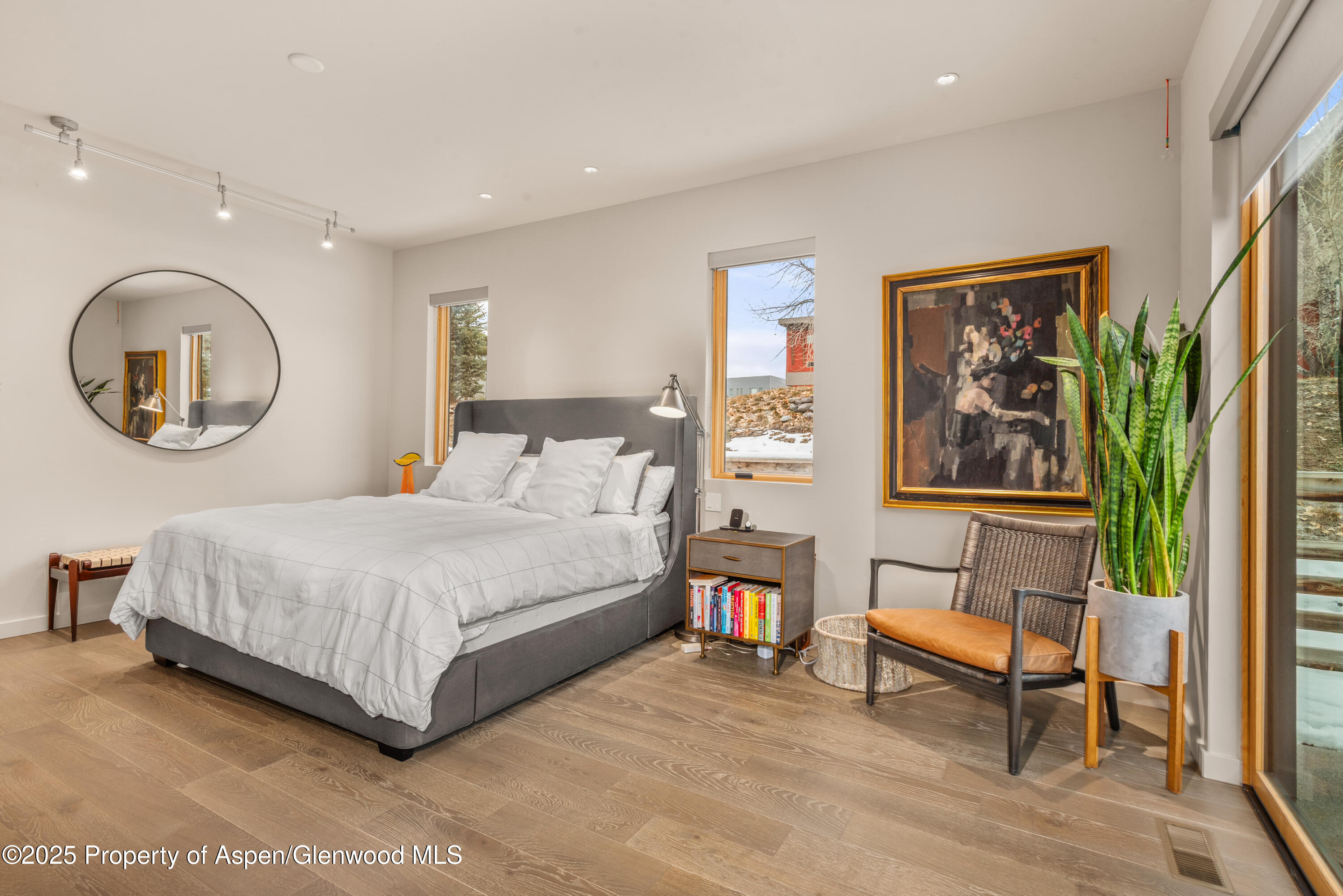 113 Valley Court Basalt, CO 81621 - Photo 16 of 34 a bedroom with a bed and a painting on the wall