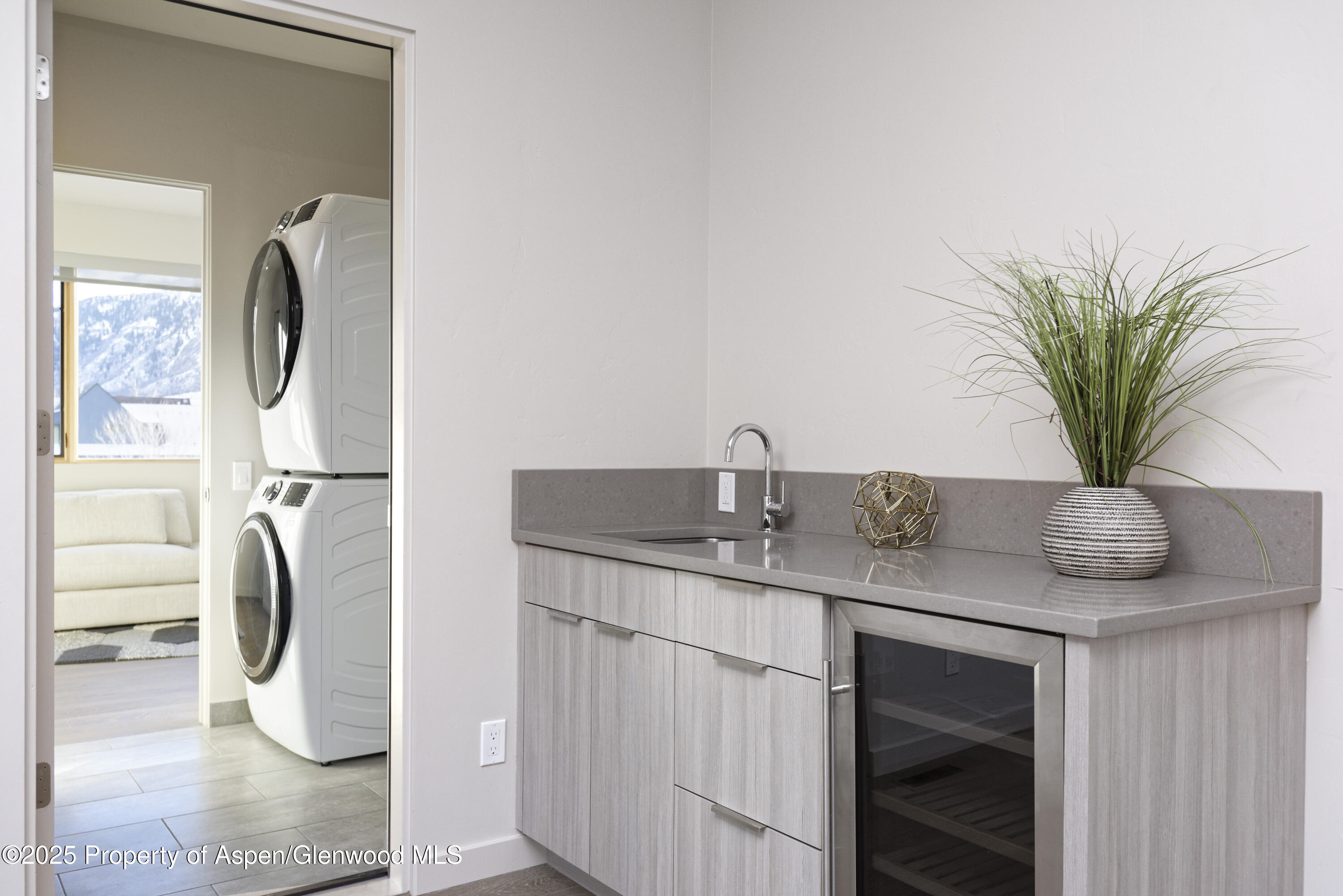 113 Valley Court Basalt, CO 81621 - Photo 30 of 34 a kitchen with a refrigerator and a sink