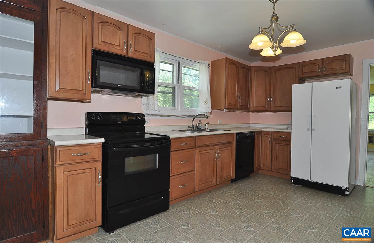 3759 Ballards Mill Road Free Union, VA 22940 - Photo 8 of 40 a kitchen with a sink stove and microwave