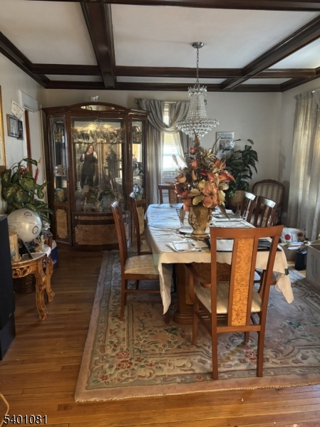 306 East 34th Street Paterson, NJ 07504 - Photo 6 of 12 a view of a dining room with furniture window and wooden floor