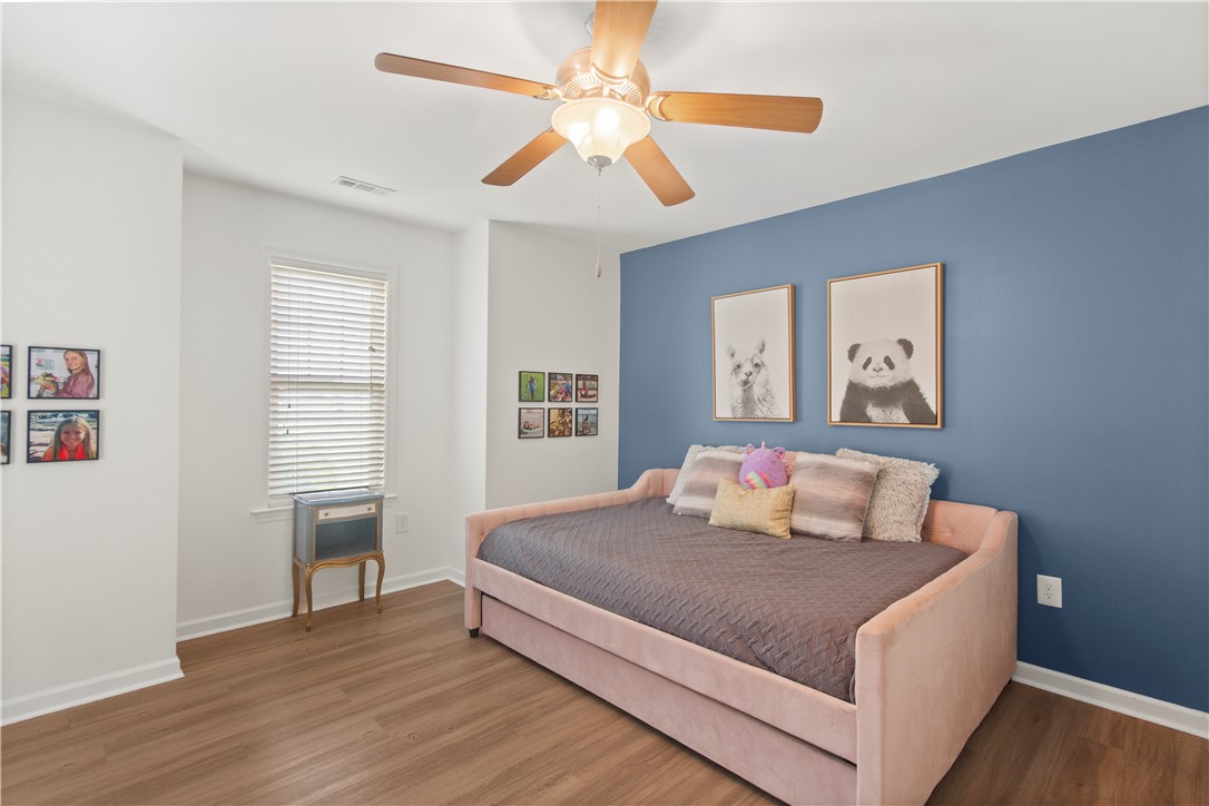 2900 Highway 187 Anderson, SC 29626 - Photo 28 of 41 A comforting bedroom with a ceiling fan, a window for natural light, and ample space.