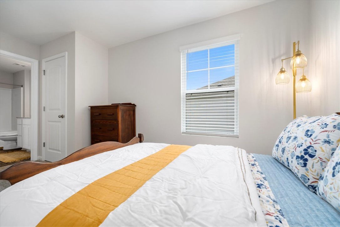117 Adger Road Pendleton, SC 29670 - Photo 22 of 36 This bright and inviting bedroom offers comfort and a private bathroom entrance.