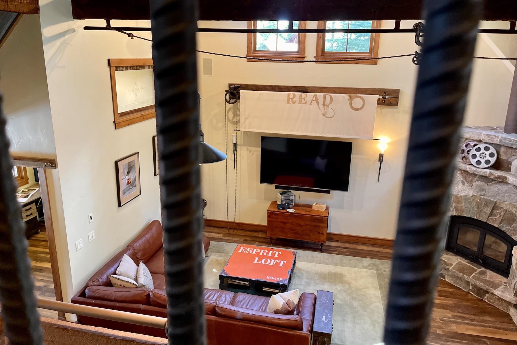 12726 Granite Drive Truckee, CA 96161 - Photo 12 of 21 a living room with furniture and a flat screen tv