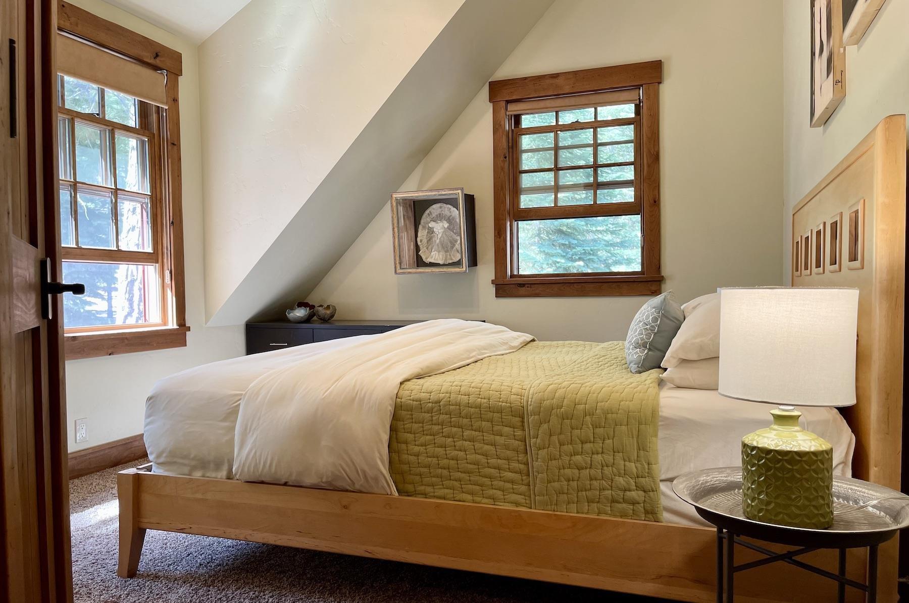 12726 Granite Drive Truckee, CA 96161 - Photo 15 of 21 a bedroom with a bed and window