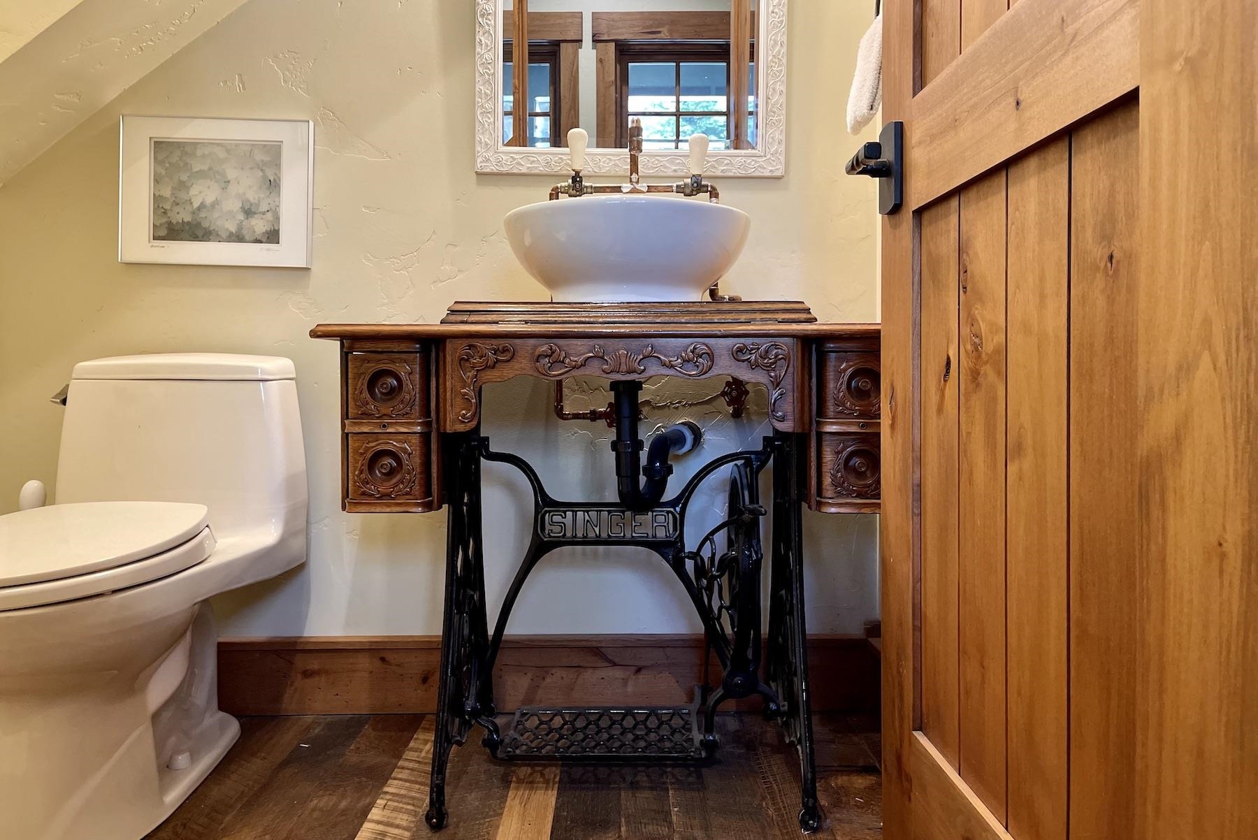 12726 Granite Drive Truckee, CA 96161 - Photo 19 of 21 a bathroom with a toilet and a mirror