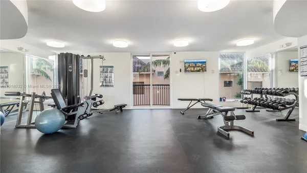 a view of a room with gym equipment