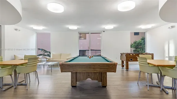 a room with furniture and wooden floor