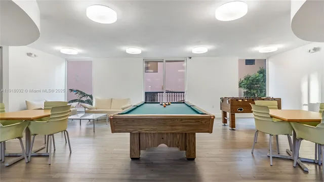 a room with furniture and wooden floor