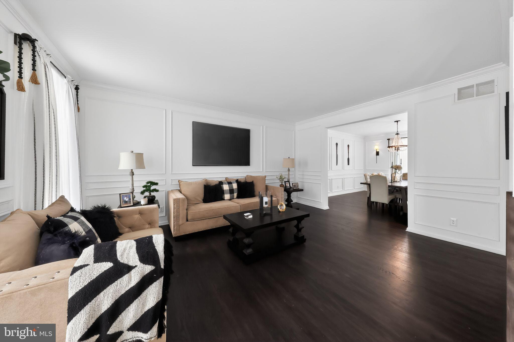 106 Coventry Lane Swedesboro, NJ 08085 - Photo 11 of 38 a living room with furniture and a flat screen tv
