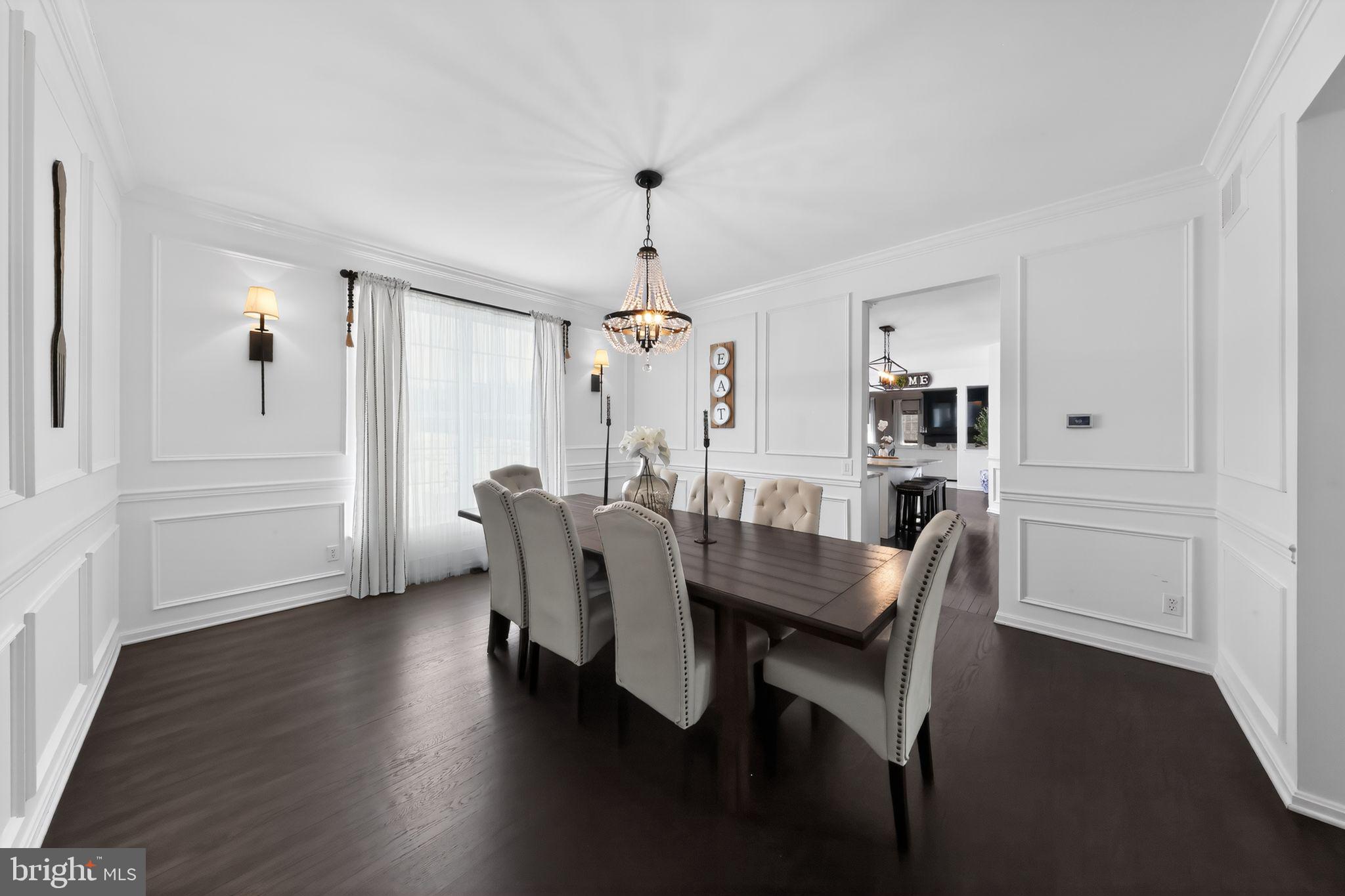106 Coventry Lane Swedesboro, NJ 08085 - Photo 13 of 38 a dining room with furniture and wooden floor