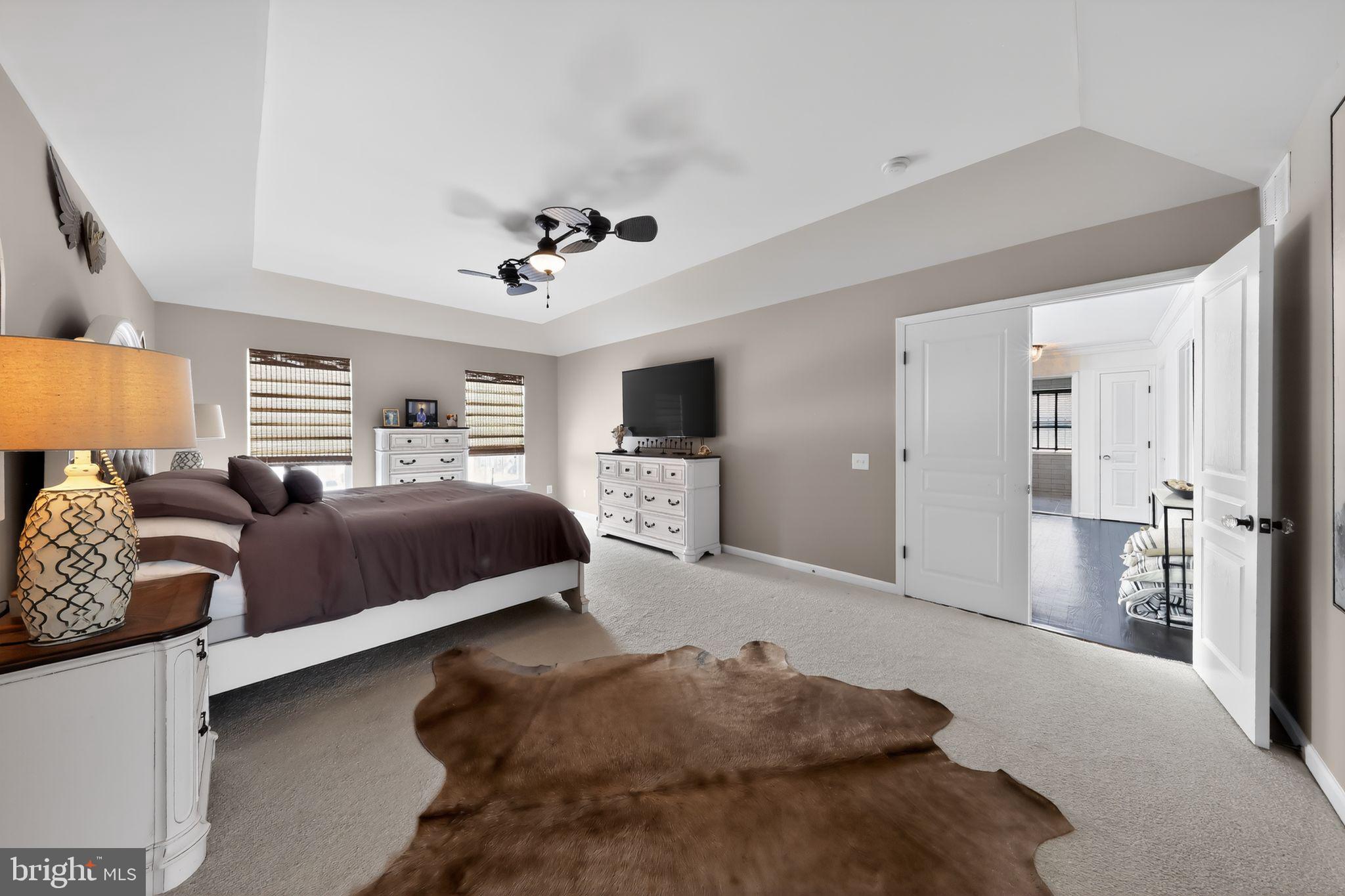106 Coventry Lane Swedesboro, NJ 08085 - Photo 24 of 38 a bedroom with a bed and ceiling fan