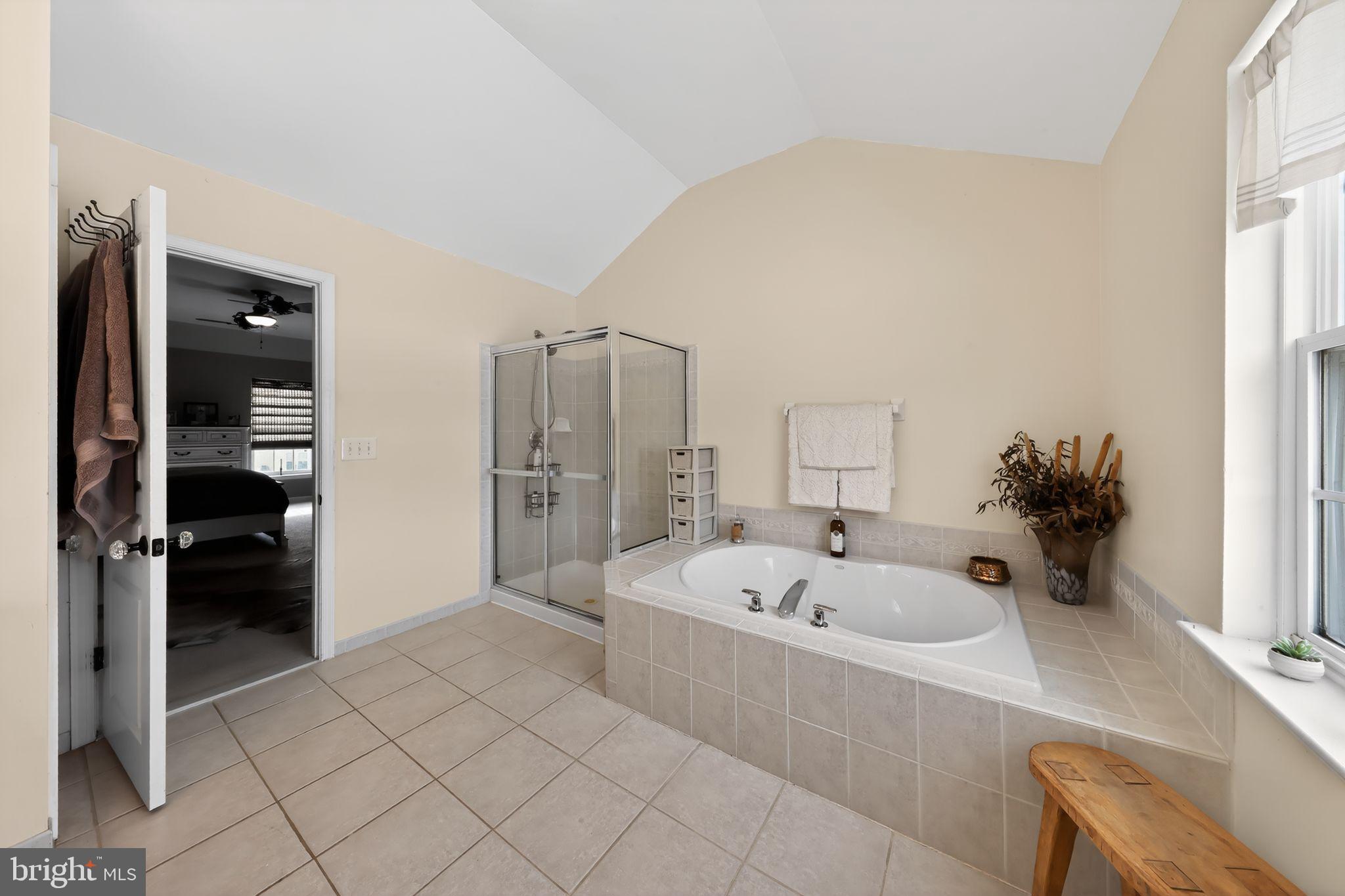 106 Coventry Lane Swedesboro, NJ 08085 - Photo 26 of 38 a bathroom with a tub sink and shower