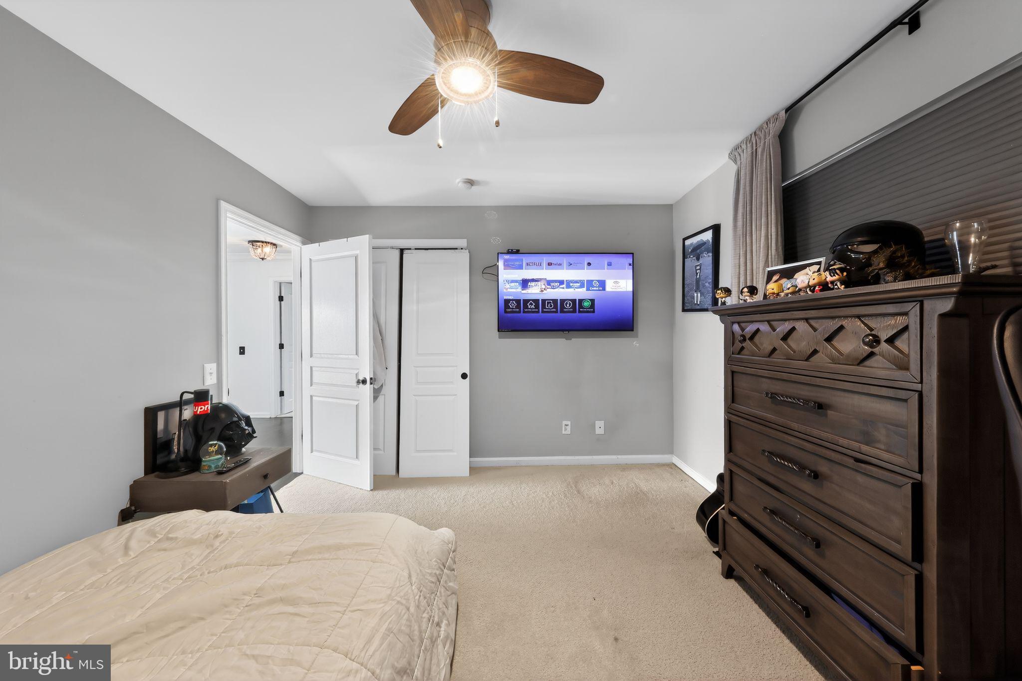 106 Coventry Lane Swedesboro, NJ 08085 - Photo 27 of 38 a bedroom with a bed and a dresser