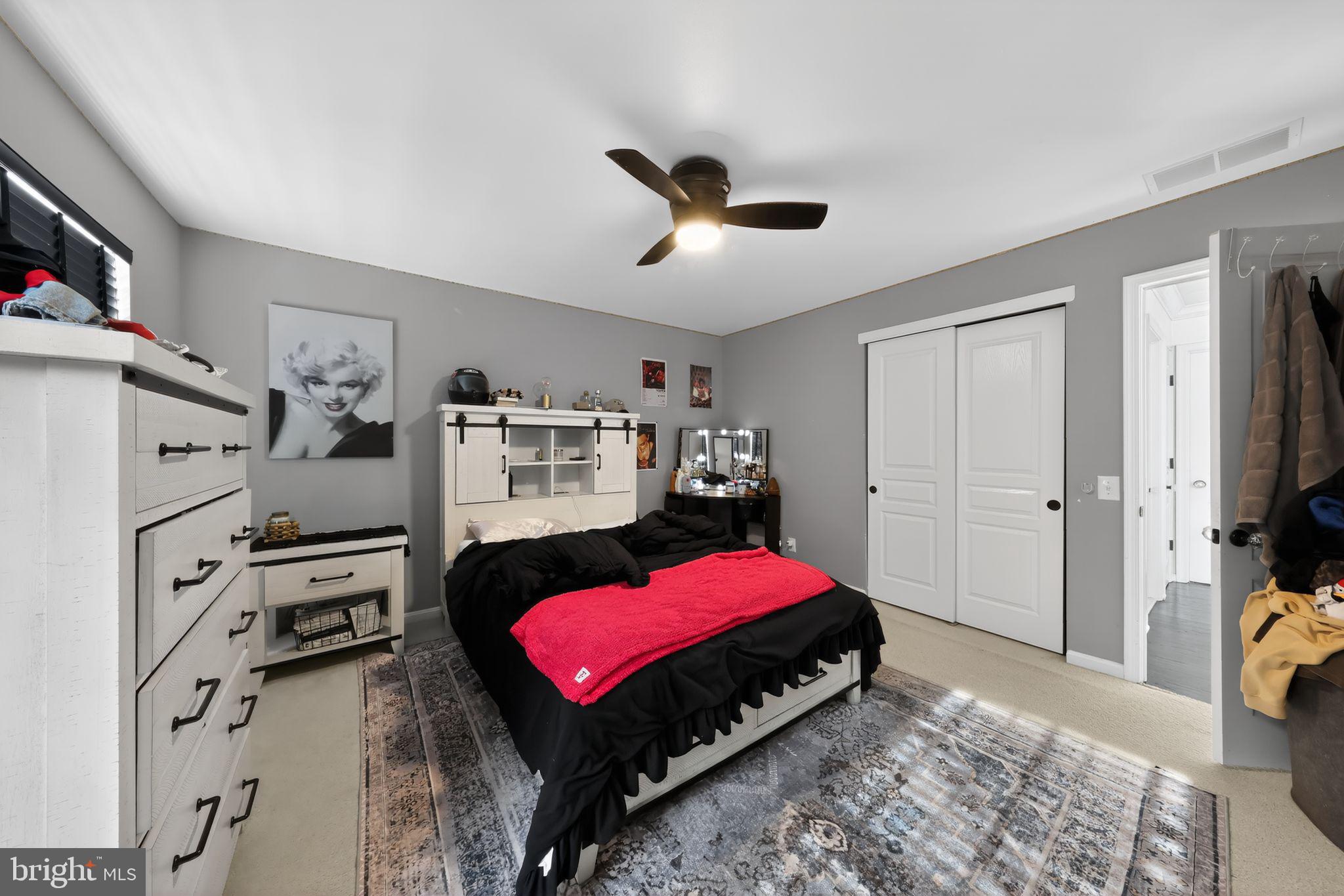 106 Coventry Lane Swedesboro, NJ 08085 - Photo 31 of 38 a bedroom with furniture and a flat tv screen