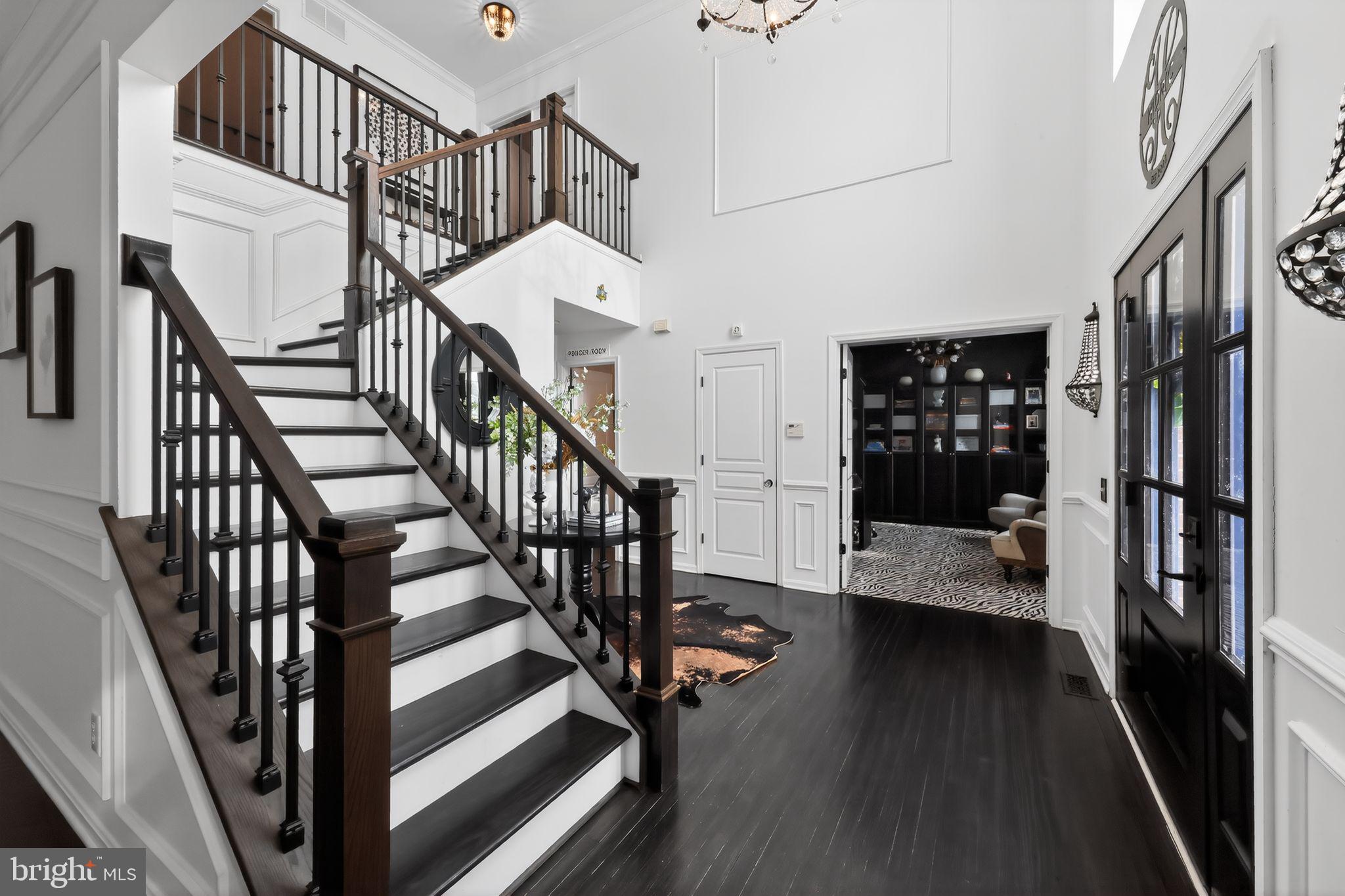 106 Coventry Lane Swedesboro, NJ 08085 - Photo 8 of 38 a view of entryway with wooden floor and stairs