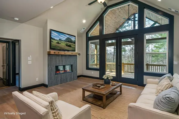 a bedroom with furniture and a fireplace