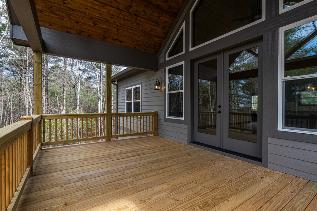 325 River Mountain Road Murphy, NC 28906 - Photo 16 of 57 a view of a balcony with wooden floor