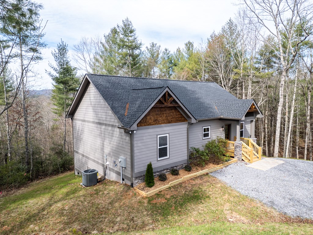 325 River Mountain Road Murphy, NC 28906 - Photo 2 of 57 a view of a house with a yard and trees