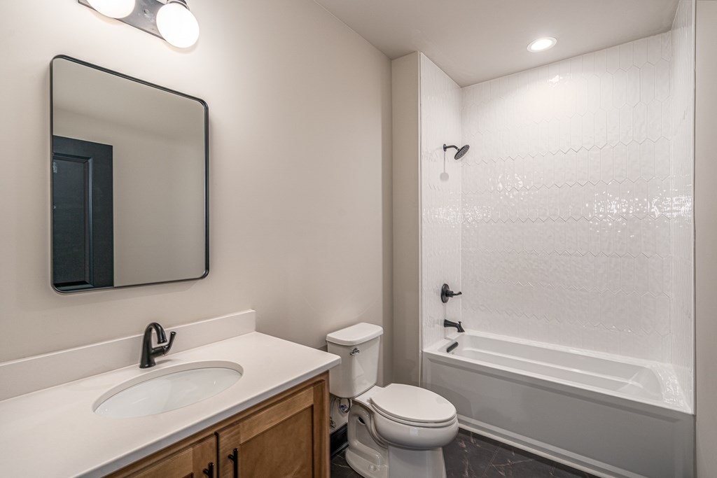 325 River Mountain Road Murphy, NC 28906 - Photo 28 of 57 a bathroom with a sink toilet and shower