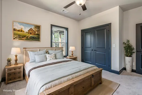 an empty room with windows and closet