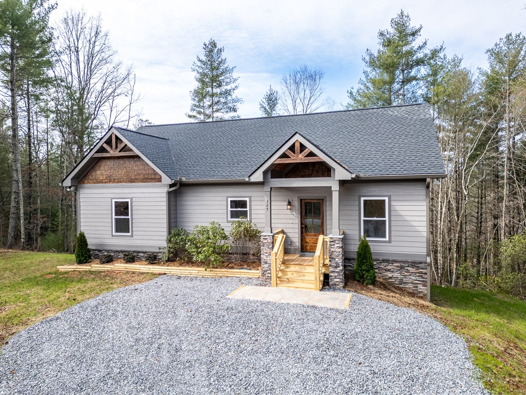 325 River Mountain Road Murphy, NC 28906 - Photo 38 of 57 a view of house with outdoor space and garden