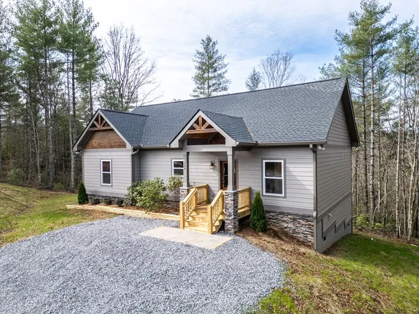 a view of mountain view with lots of trees