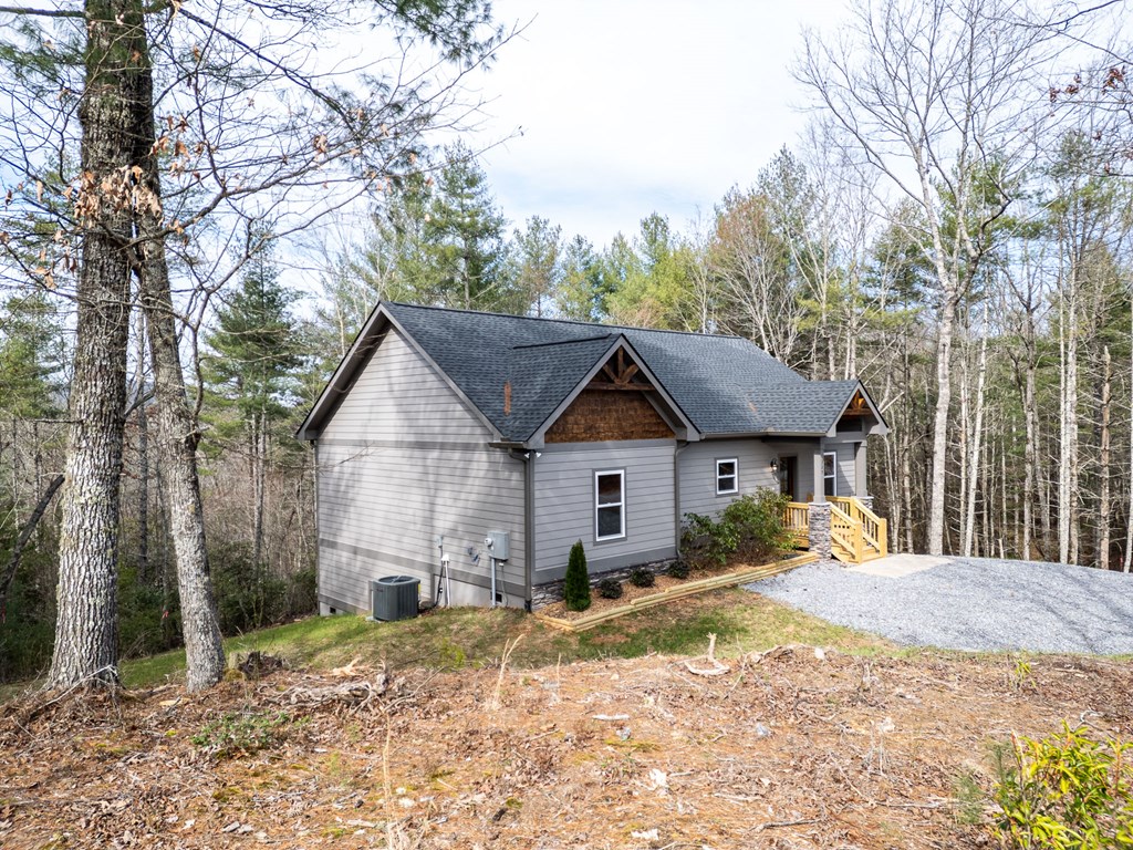 325 River Mountain Road Murphy, NC 28906 - Photo 45 of 57 a view of a house with a yard covered in snow