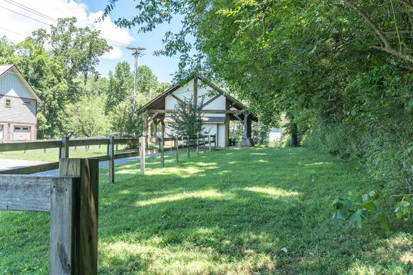 a view of deck with table and chairs and wooden floor