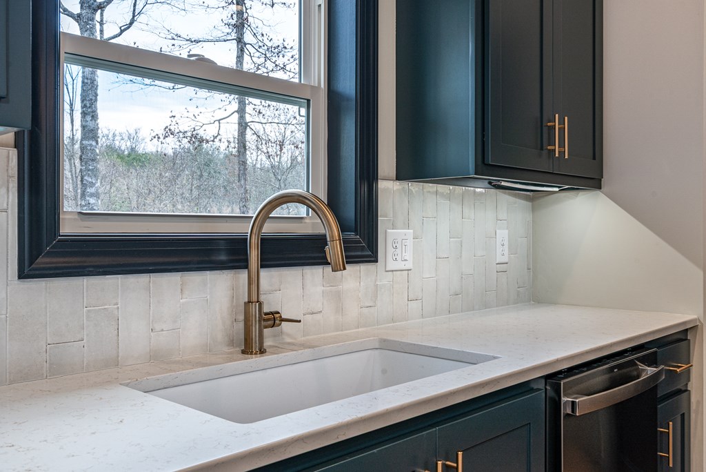 325 River Mountain Road Murphy, NC 28906 - Photo 7 of 57 a kitchen with a sink and a window