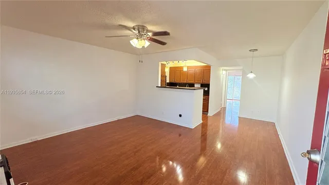 a view of a livingroom with a flat screen tv