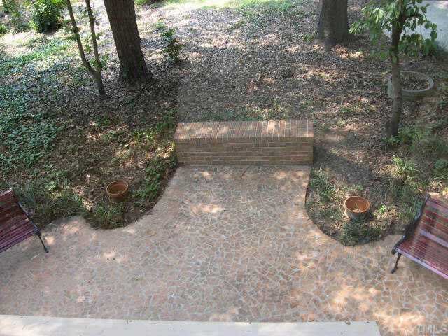 3306 Sussex Road Raleigh, NC 27612 - Photo 10 of 10 a view of a yard