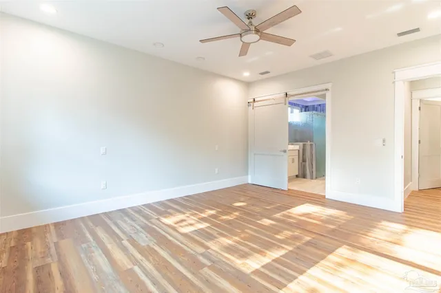 a bathroom with a shower and a sink