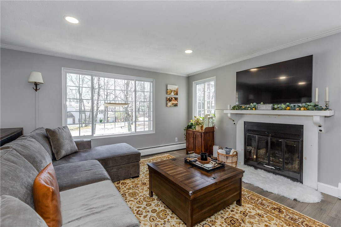 34 Eagle Run, Unit C Warwick, RI 02818 - Photo 5 of 29 Living room with fireplace