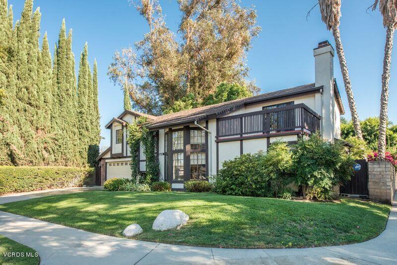 19620 Leadwell Street Reseda, CA 91335 - Photo 2 of 28 a front view of a house with garden