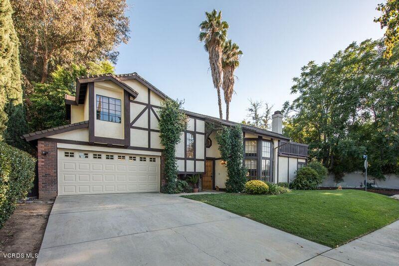 19620 Leadwell Street Reseda, CA 91335 - Photo 4 of 28 a view of a house with a yard and plants