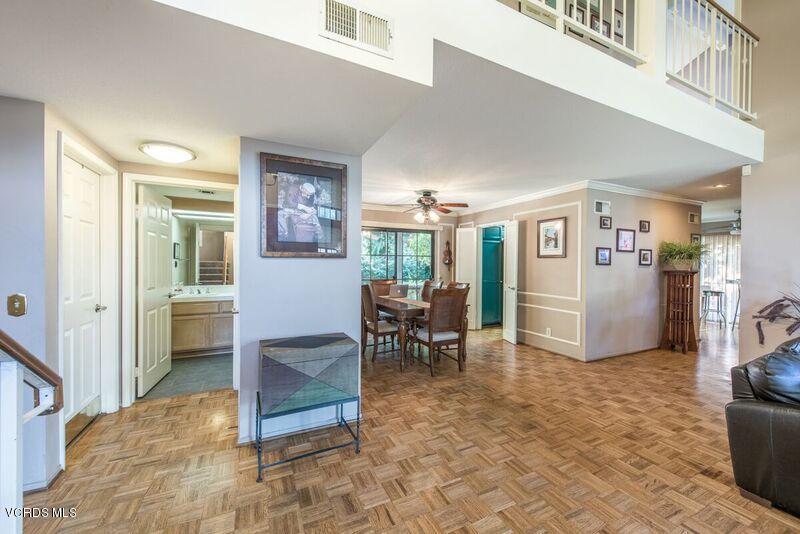 19620 Leadwell Street Reseda, CA 91335 - Photo 6 of 28 a living room with furniture a dining table and chairs