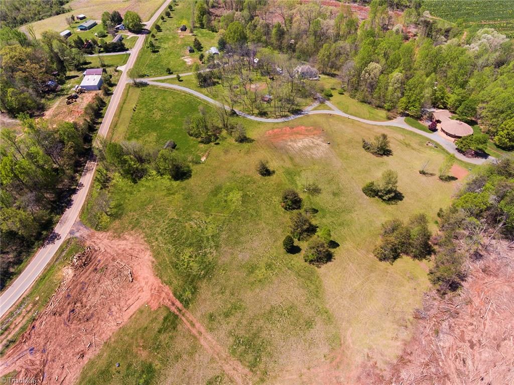 Partially clear cut, rolling, natural land