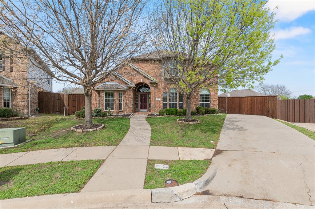 613 Windward Drive Murphy, TX 75094 - Photo 2 of 37 a view of house with yard