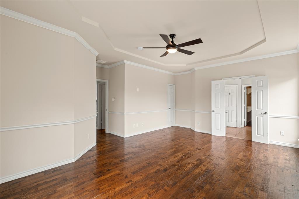 613 Windward Drive Murphy, TX 75094 - Photo 23 of 37 a view of empty room with wooden floor