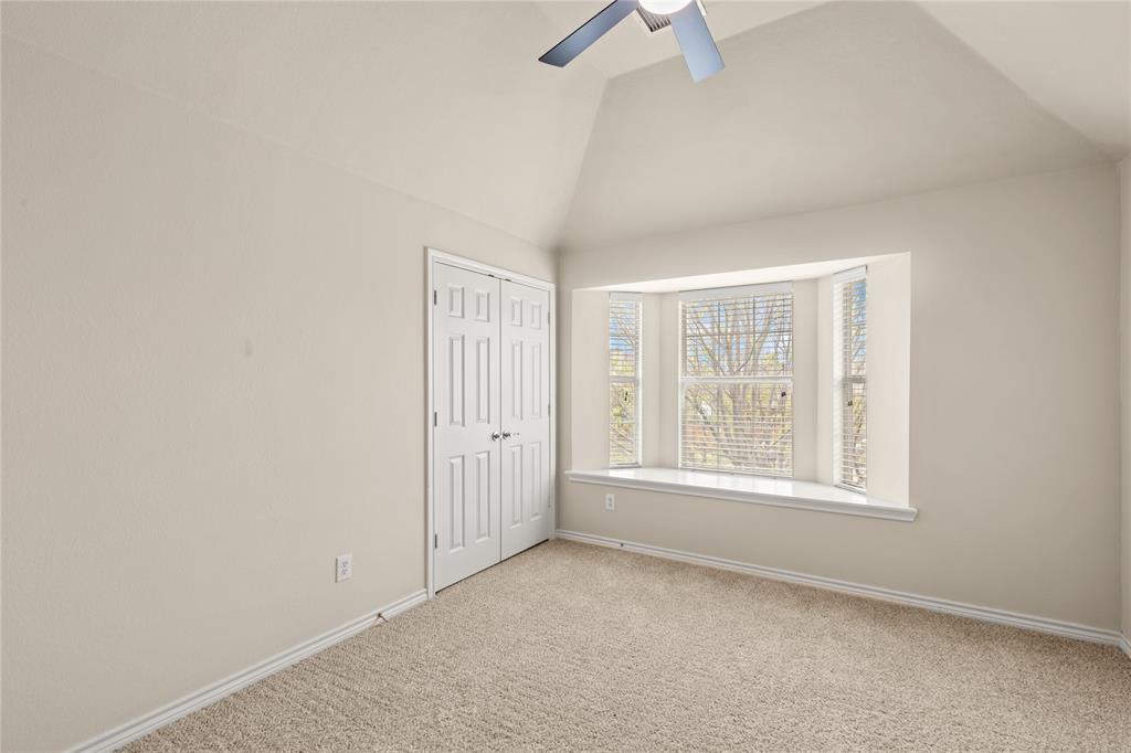 613 Windward Drive Murphy, TX 75094 - Photo 29 of 37 an empty room with windows and closet