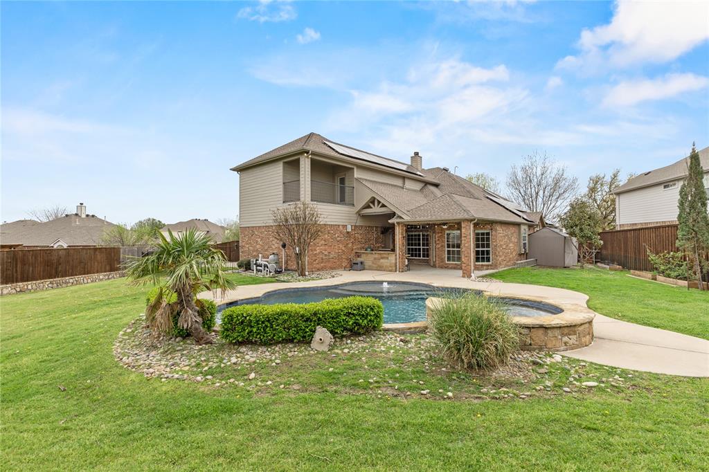 613 Windward Drive Murphy, TX 75094 - Photo 5 of 37 a front view of a house with a yard