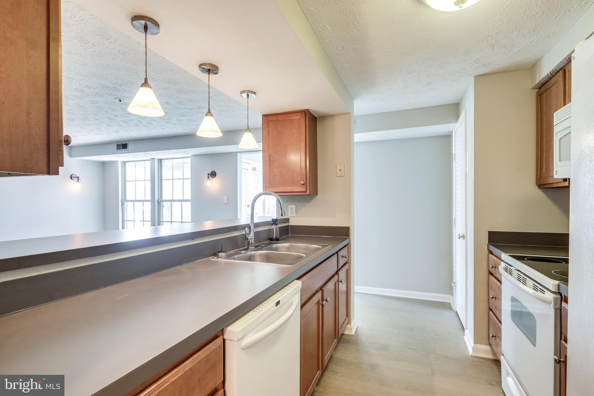 6375 Greenfield Road, Unit 1504 Elkridge, MD 21075 - Photo 8 of 27 Replaced counters, appliances and light fixtures